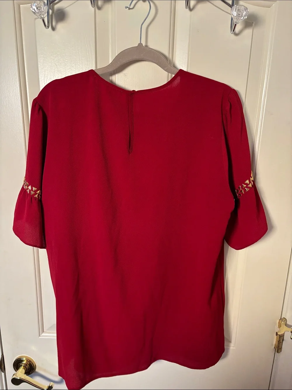 Micharl Kors burgundy Embellished Flutter Sleeve Top with gold studs
